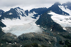 Photo courtesy of Debra Austin. A stream flows out of the base of the glacier.