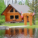 Large log cabin near the lake.
